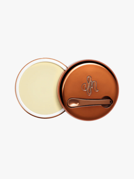 Danessa Myricks Beauty Yummy Skin Blurring Balm Powder in branded component on a light gray background